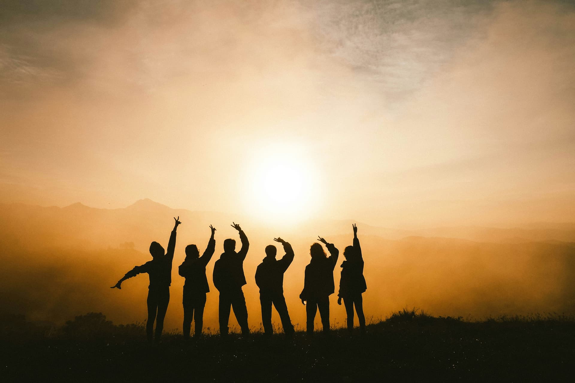 Friends on summit of a mountain